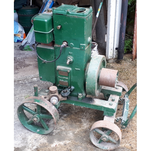 384 - A Lister stationary petrol engine, manufactured by R.A.Lister & Co Ltd, Dursley, England, with belt-... 