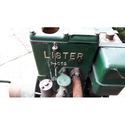 384 - A Lister stationary petrol engine, manufactured by R.A.Lister & Co Ltd, Dursley, England, with belt-... 