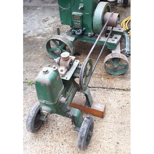 384 - A Lister stationary petrol engine, manufactured by R.A.Lister & Co Ltd, Dursley, England, with belt-... 