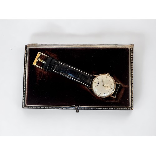 120 - A vintage 9ct gold cased gents Longines wristwatch, C.1950’s, the silvered dial with gilt batons den... 