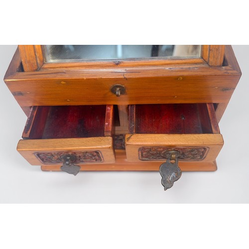 375 - A Chinese portable vanity box, with adjustable easel mirror with three carved drawers beneath, toget... 