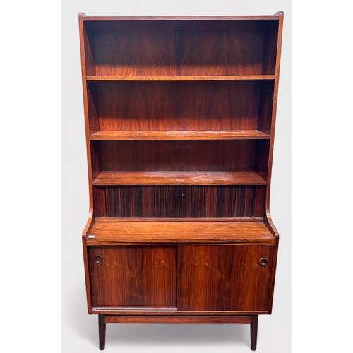 633 - A 1960-70’s rosewood and teak bureau-bookcase with three shelves above a dual-tambor front enclosing... 