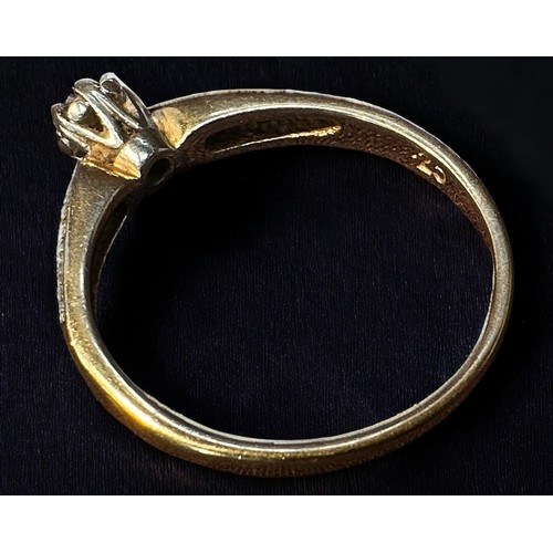 180 - A 14ct gold and diamond ring, centrally claw set with a round brilliant cut diamond, flanked by ten ... 