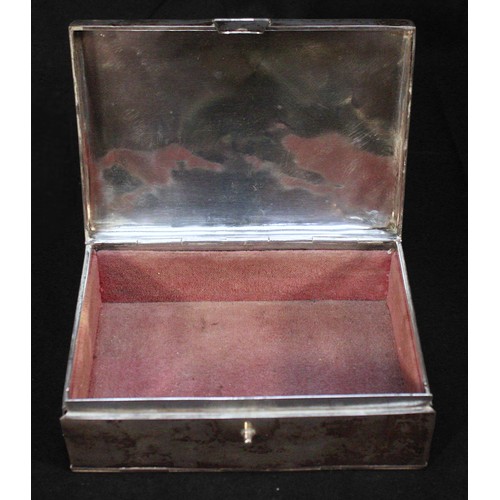 96 - A Chinese export silver cigarette box by Wang Hing, of rectangular form, with hinged lid, lined inte... 