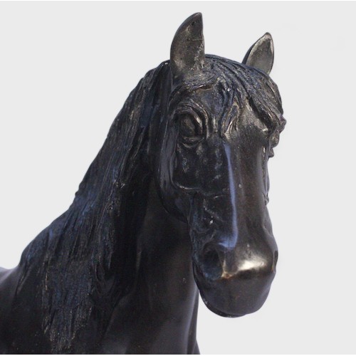 605 - A large 'lost wax' cast and patinated bronze model of a Stallion, 46x60cm