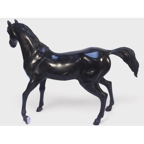 605 - A large 'lost wax' cast and patinated bronze model of a Stallion, 46x60cm