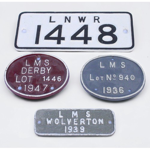 395 - Four various cast iron wagon plates, including an LNWR Crane Plate number ‘1448’, and three L.M.S. w... 