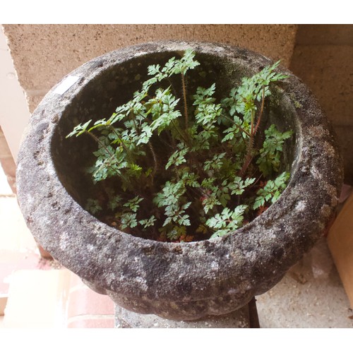 386 - A stone garden pedestal urn, 73cm high .