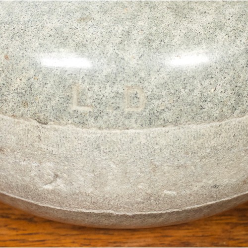 387 - Two various granite curling stones, one with ribbed handle, diamond registration mark and stamped 'T... 