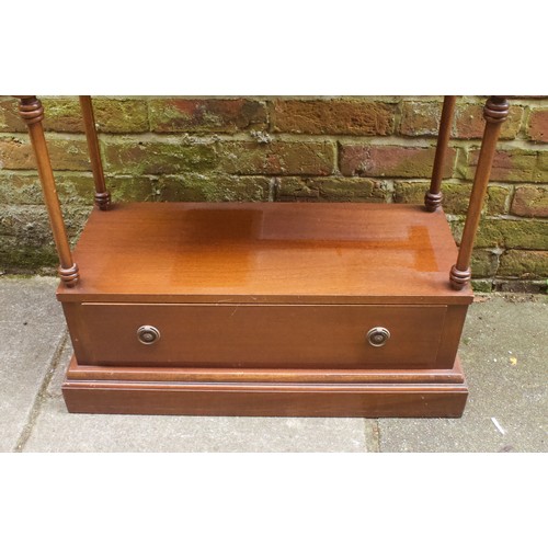 631 - A Bevan & Funnell 'Reprodux' mahogany four-tier whatnot, of rectangular form with spindle-turned she... 