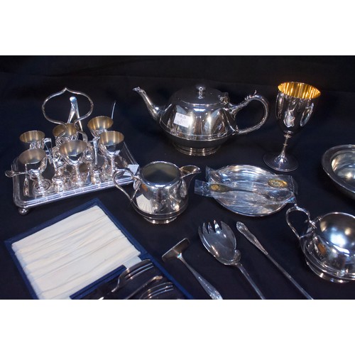 97 - A collection of assorted silver-plated items including a James Dixon & Sons cruet egg set, a muffin ... 