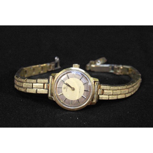 133 - A ladies gold-plated Omega De Ville manual wind wristwatch, the gilt dial with applied gilt batons d... 