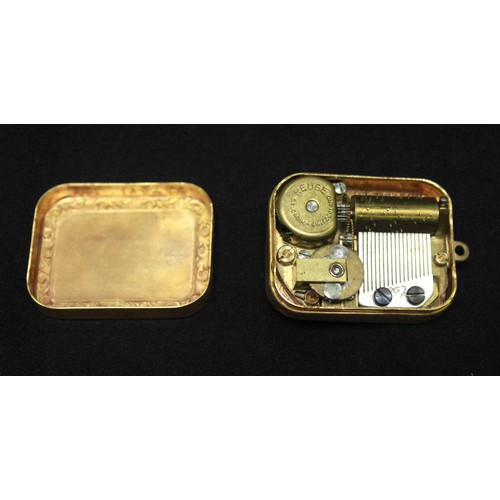 415 - A pocket key-wound music box with Swiss Reuge movement in a novelty vinaigrette 'style' gilt brass c... 