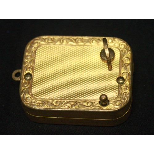 415 - A pocket key-wound music box with Swiss Reuge movement in a novelty vinaigrette 'style' gilt brass c... 