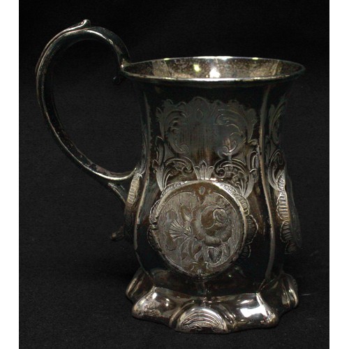 98 - A Victorian silver Christening tankard of panelled baluster form, with foliate engraved roundels and... 