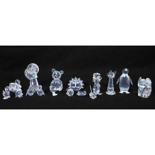 21 - Fifteen Swarovski Crystal stylised animals, including eleven with branded carboards tubes is issued,... 