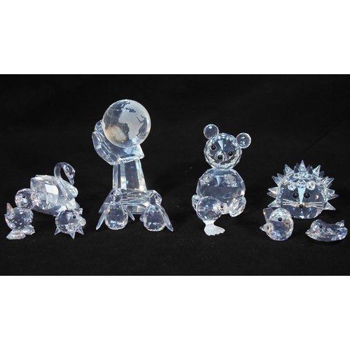 21 - Fifteen Swarovski Crystal stylised animals, including eleven with branded carboards tubes is issued,... 