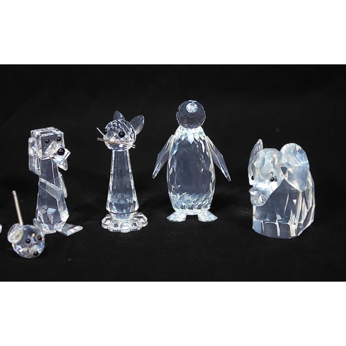 21 - Fifteen Swarovski Crystal stylised animals, including eleven with branded carboards tubes is issued,... 