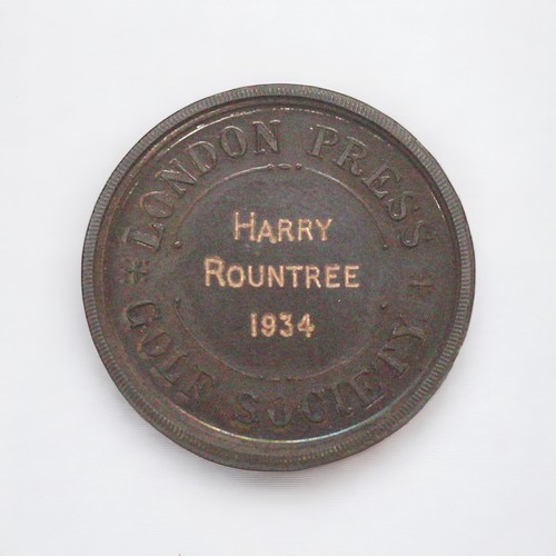 425 - Harry Rountree / Golf Interest.  A bronze struck golf medal engraved for 'Harry Rountree 1931,' reve... 