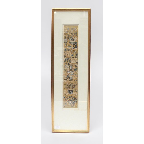 59 - A pair of Chinese silk and bold thread embroidered rectangular panels, mounted, glazed and framed, 4... 