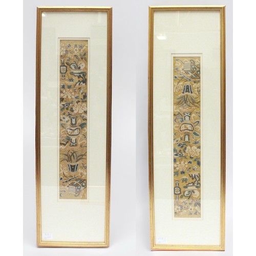 59 - A pair of Chinese silk and bold thread embroidered rectangular panels, mounted, glazed and framed, 4... 