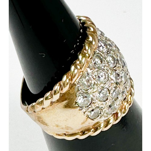 196 - A 9ct yellow gold wide band dress ring, set with white faceted stones, weight 6.9 grams.