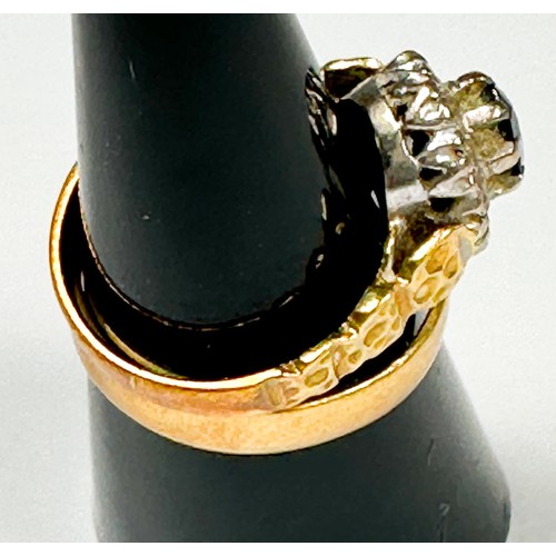 200 - An 18ct gold wedding ring, together with an 18ct gold sapphire and diamond dress ring, set with an o... 