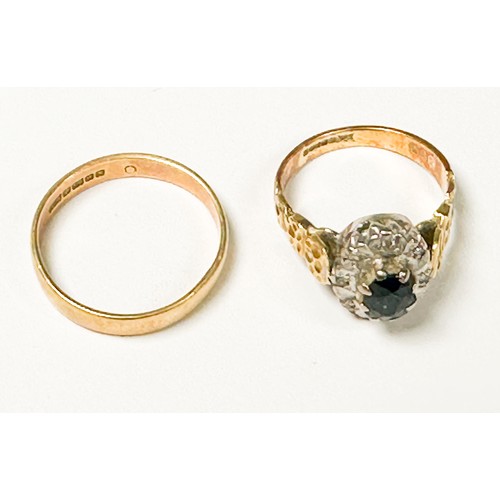 200 - An 18ct gold wedding ring, together with an 18ct gold sapphire and diamond dress ring, set with an o... 