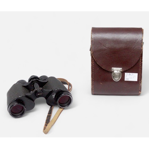 512 - Two pairs of Carl Zeiss binoculars, both multi-coated Jenoptem examples, one 10 x 50W, the other 8 x... 