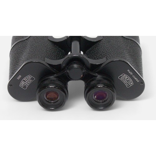 512 - Two pairs of Carl Zeiss binoculars, both multi-coated Jenoptem examples, one 10 x 50W, the other 8 x... 