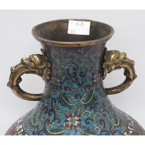 63 - An early 20th century Chinese cloisonne enamel vase, of baluster form with gilt-brass elephant handl... 