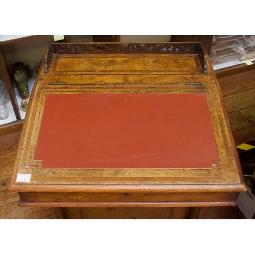 647 - A Victorian burr walnut Davenport desk, with three-quarter pierced fretwork gallery with secret lock... 