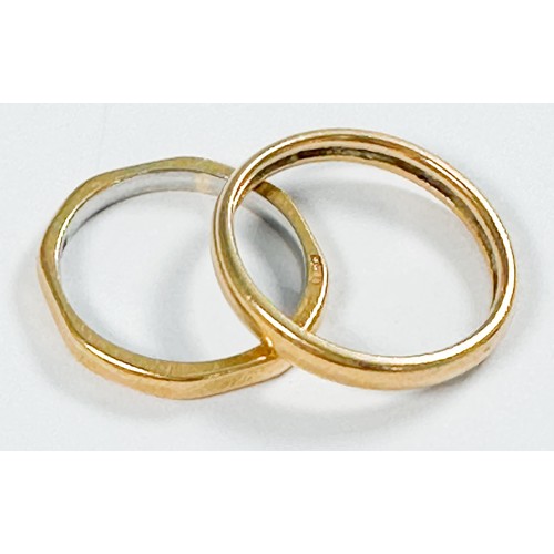 169 - A gold wedding ring (hallmark obscured), and a gold and platinum wedding ring, total weight 5.5 gram... 