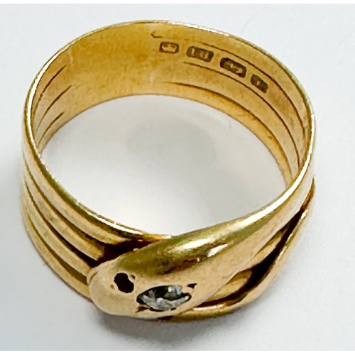 170 - An 18ct gold ring, modelled as a coiled serpent with an old cut diamond set to the head, estimated 0... 