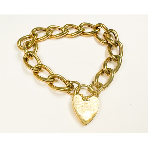 235 - A 9ct yellow gold extra large curb link bracelet, with heart padlock fastening, weight 21.5 grams.