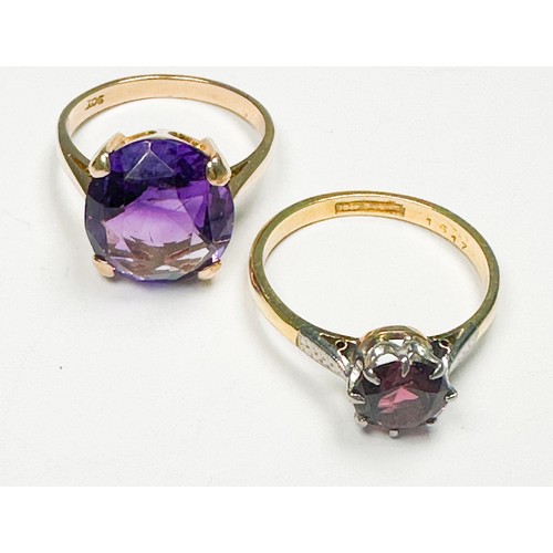 246 - A 9ct yellow gold dress ring, claw set with a large oval shaped amethyst, measuring 14mm x 12mm, tog... 