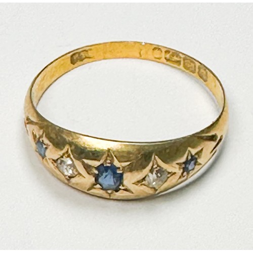 219 - An 18ct yellow gold gypsy style ring, star-set with 3 x sapphires and 2 x diamonds, hallmarked Birmi... 