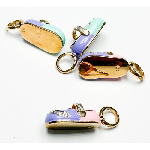 241 - Two pairs of 9ct yellow gold and enamel shoe charms, set with small diamonds, total weight 11.0 gram... 