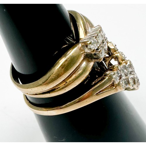 243 - A 9ct yellow gold dress ring, set with five small round diamonds to the centre, ring weighs 2.5 gram... 