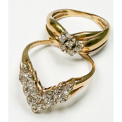 243 - A 9ct yellow gold dress ring, set with five small round diamonds to the centre, ring weighs 2.5 gram... 