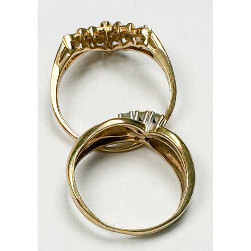 243 - A 9ct yellow gold dress ring, set with five small round diamonds to the centre, ring weighs 2.5 gram... 