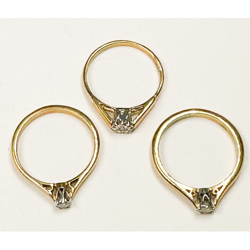 244 - Three 9ct yellow gold solitaire diamond rings, one ring illusion set with small diamond, the other t... 