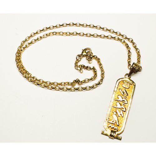 250 - A 9ct gold hieroglyphic pendant and 9ct gold belcher chain, total weight 7.2 grams.