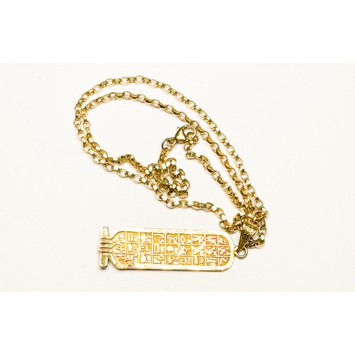 250 - A 9ct gold hieroglyphic pendant and 9ct gold belcher chain, total weight 7.2 grams.