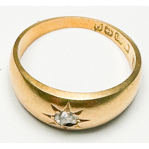 257 - An 18ct yellow gold ring, star-set to the centre with a Victorian cut diamond (diamond chipped), rin... 