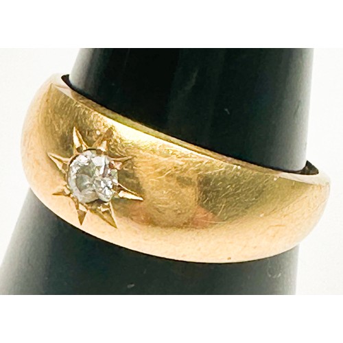 257 - An 18ct yellow gold ring, star-set to the centre with a Victorian cut diamond (diamond chipped), rin... 