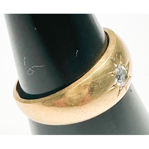 257 - An 18ct yellow gold ring, star-set to the centre with a Victorian cut diamond (diamond chipped), rin... 