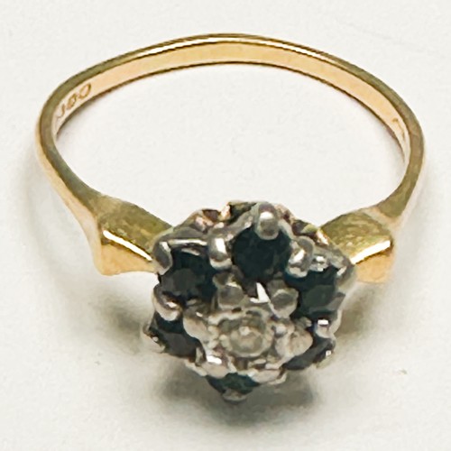 258 - An 18ct yellow gold dress ring, claw-set with a round diamond to the centre, surrounded by 6 x sapph... 