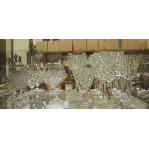 38 - A collection of assorted Waterford Crystal glasses, including nine water goblets in the Comeragh and... 