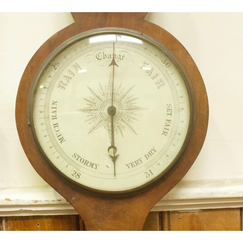 520 - A 19th century mercury wheel barometer with thermoimeter, hygrometer and spirit level, 95cm (A/F)